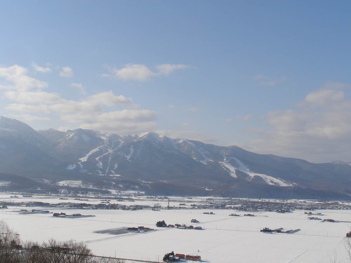 A wide view across Furano Ski Resort's groomed runs in central Hokkaido