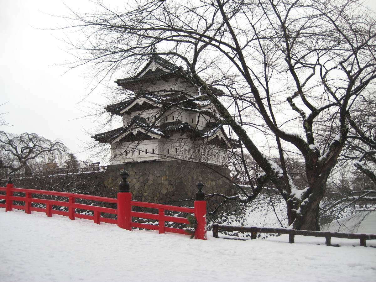Hirosaki Castle's keep standing in snow, Aomori Prefecture