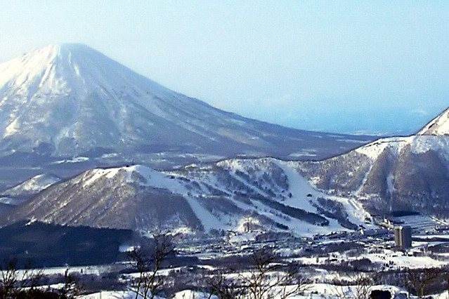 Rusutsu's West Mountain ski slopes with Mount Yotei behind
